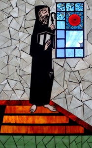 Stained glass mosaic of St Benedict