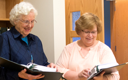 Sister Joanne introduces retreatant to prayer books used for daily prayer